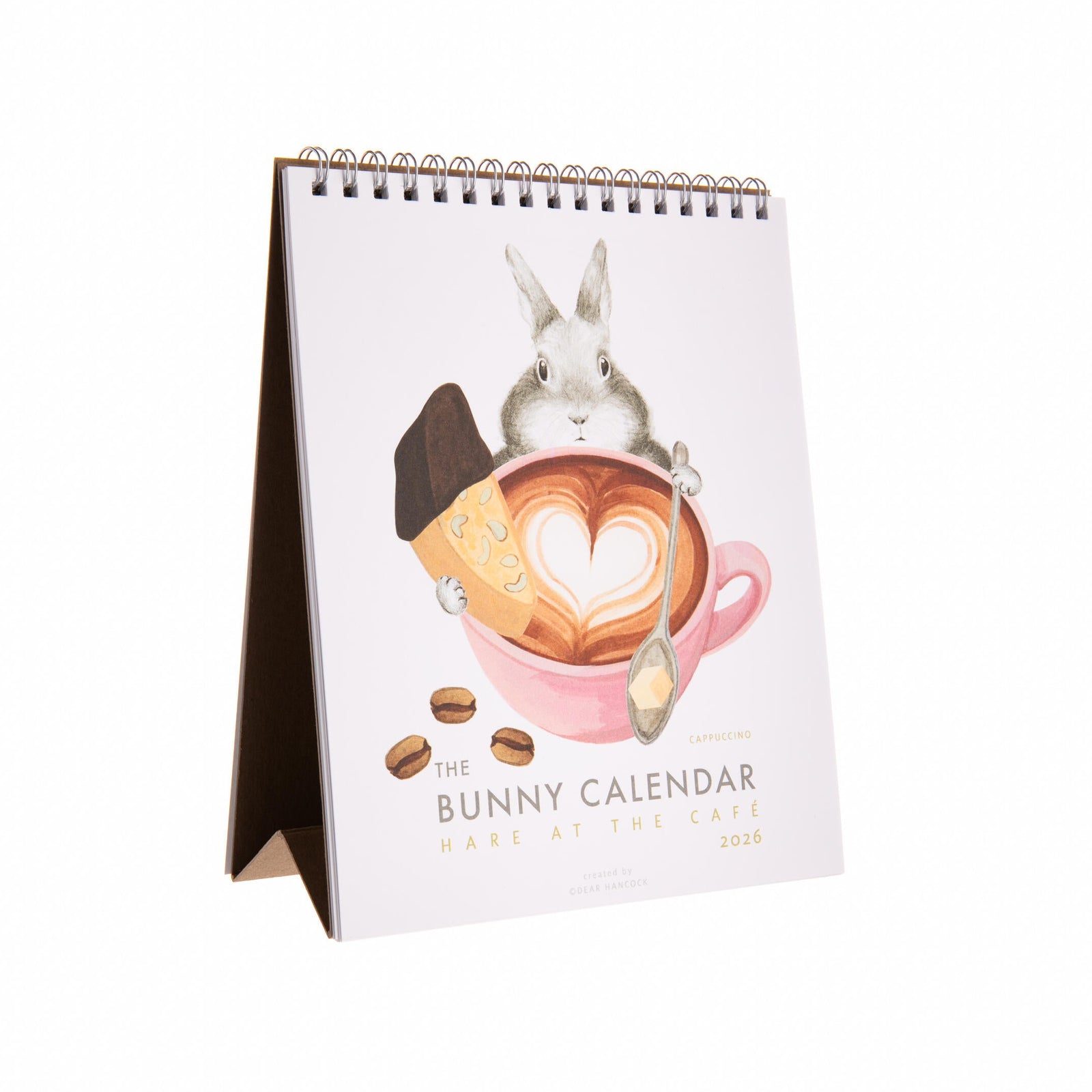 Calendar with a bunny design holding a coffee cup on a white background