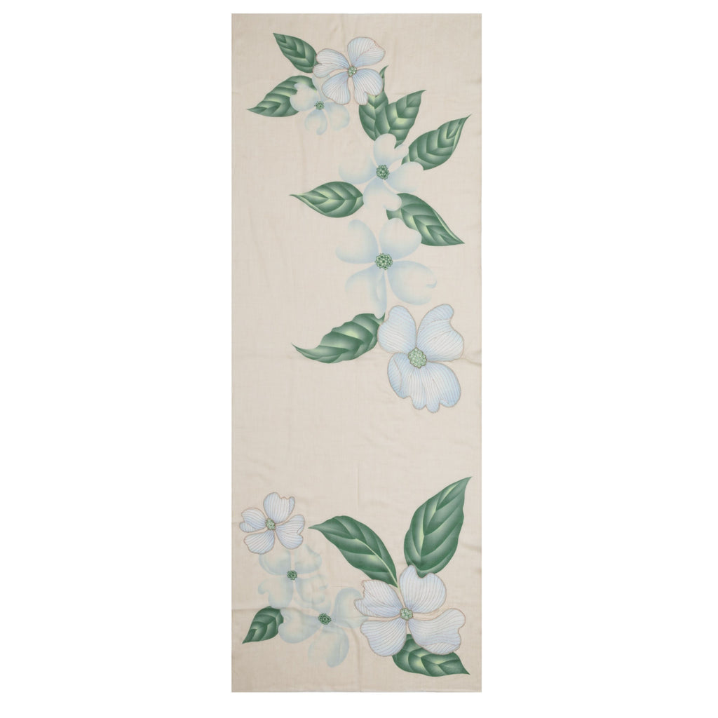 This exquisite, butter-soft scarf is crafted from the finest blend of silk and cashmere by artisans in India. The scarf is decorated using a traditional Kalamkari technique, the art of hand-brush painting, with beading and embroidery overlays. It features gorgeous white-blue dogwood flowers with verdant green leaves. Material: 70% cashmere, 30% silk Dimensions: 31" x 80"