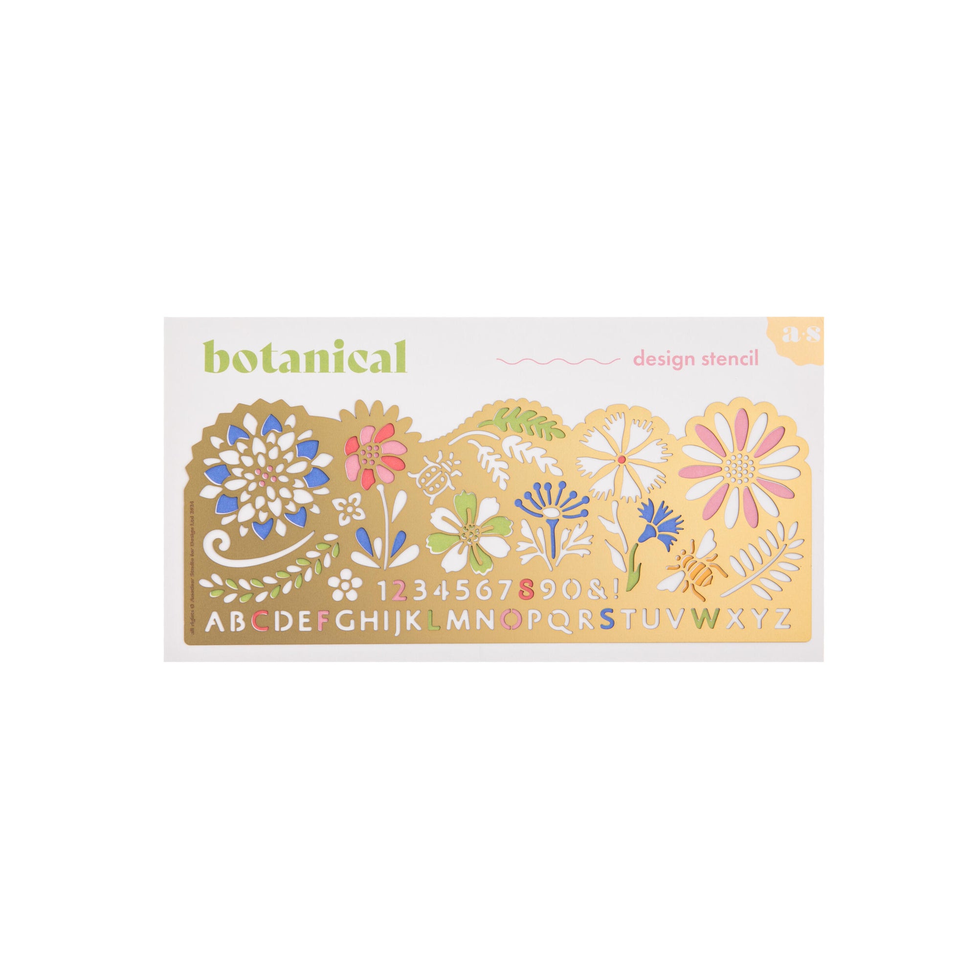 Decorative brass stencil with floral patterns and letters on a white background