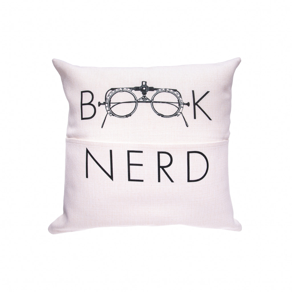 Relax with your favorite book, and then stow it away neatly when you're done with this handy 'Book Nerd' pillow cover. Made from a soft, durable fabric the pocket can also be used to store your tablet, TV remote, or anything you want to keep tucked away on your couch or bed. Fits an 18" x 18" pillow insert.