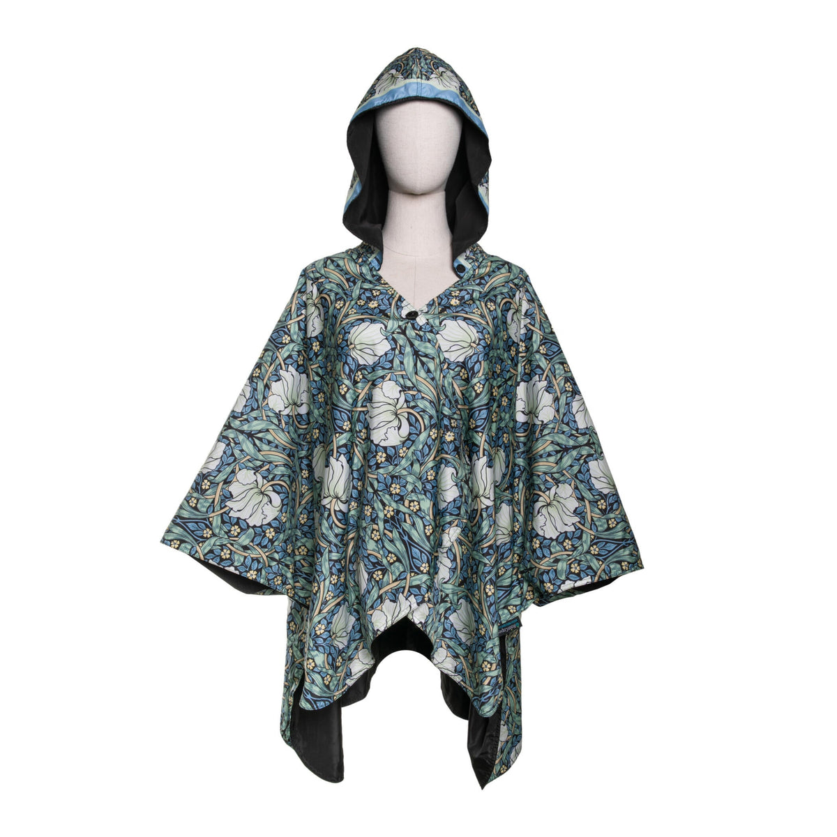 Floral patterned hooded poncho on a mannequin against a white background