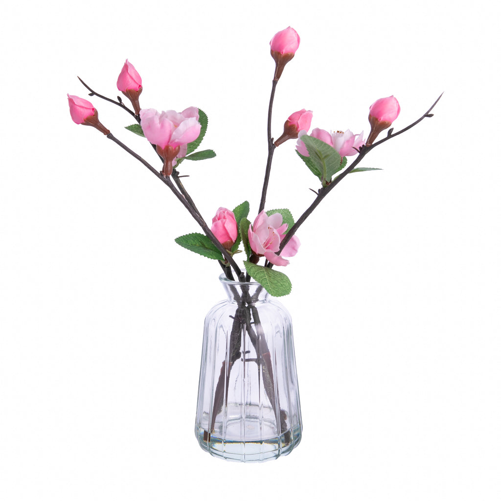 These pink cherry blossoms are actually faux flowers! In a glass vase, these very charming blossoms would look stunning as part of a centerpiece for your dining table, or atop some shelves for a pop of pink. Faux pink flowers in glass vase Dimensions: Approx. 10.5" H (total), base: 2.5" diameter