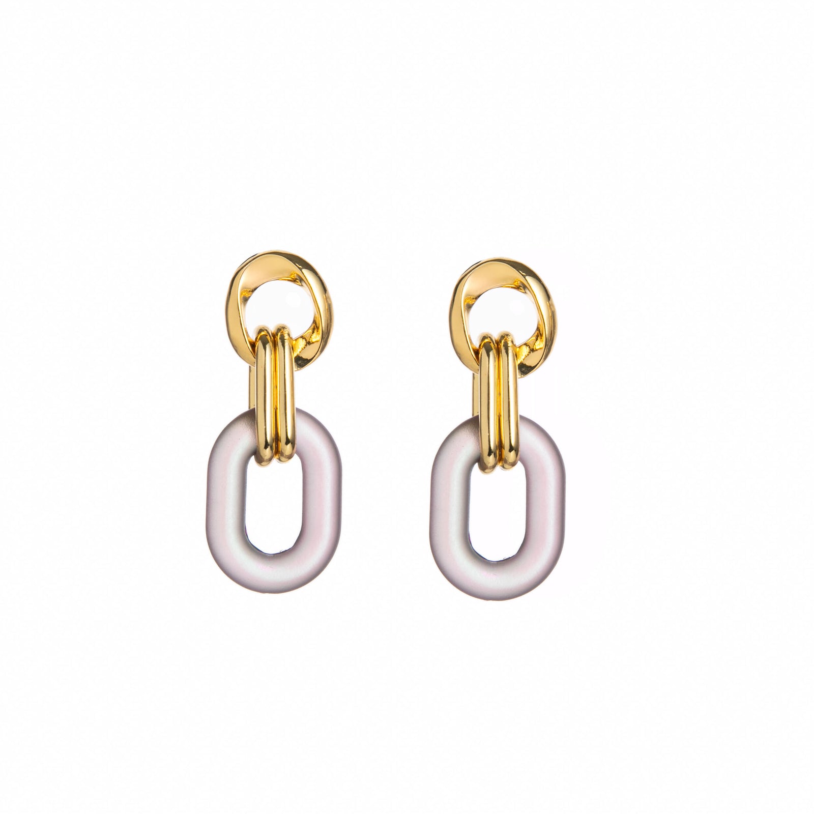 Gold and white hoop earrings on a white background