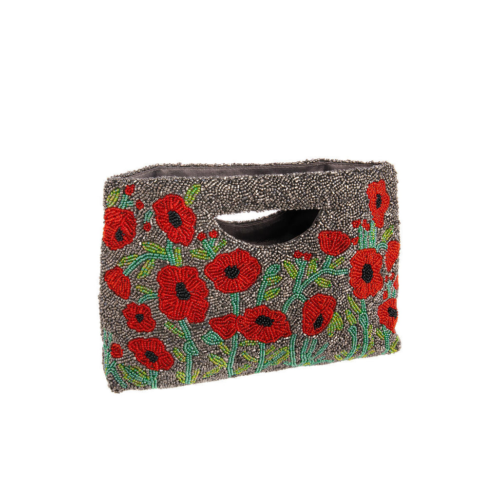 This dazzling poppy clutch shows off your love of style and flowers. With handmade details and a satin interior, you will feel classy every time you hold it.