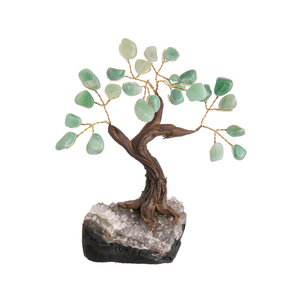 Rumored to bring luck and prosperity to the owner, there's a good reason money trees are popular gifts for executives and frequently used as office decor or as housewarming presents. This ornament features green quartz 'leaves' and a geode crystal base. Dimensions: 6" x 5".