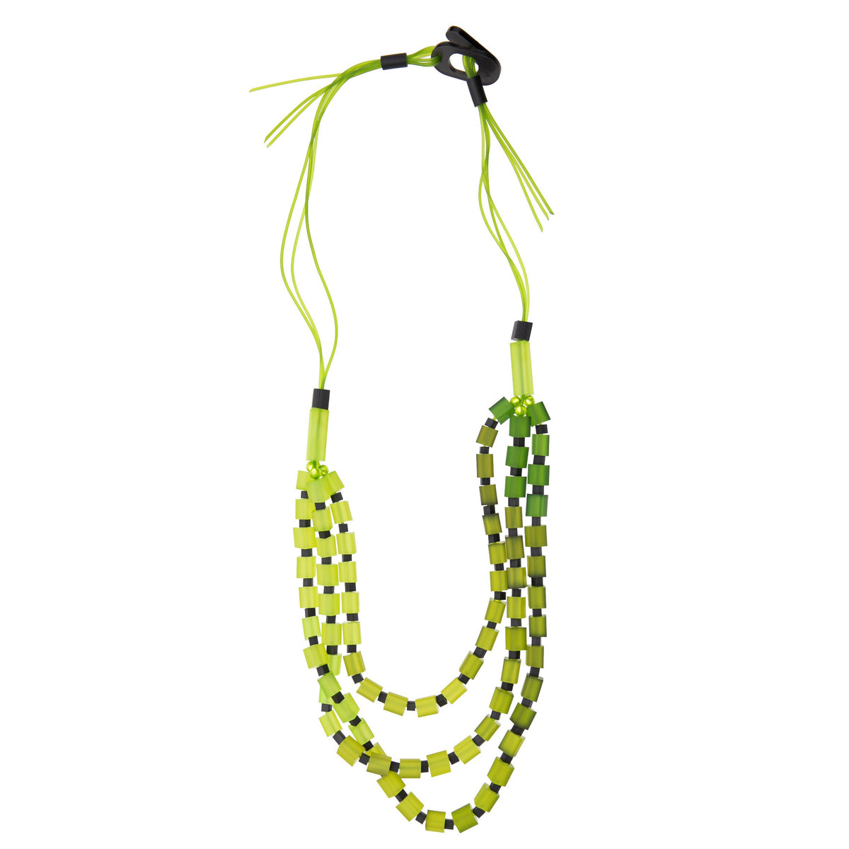 Necklace with green and black beads on a white background