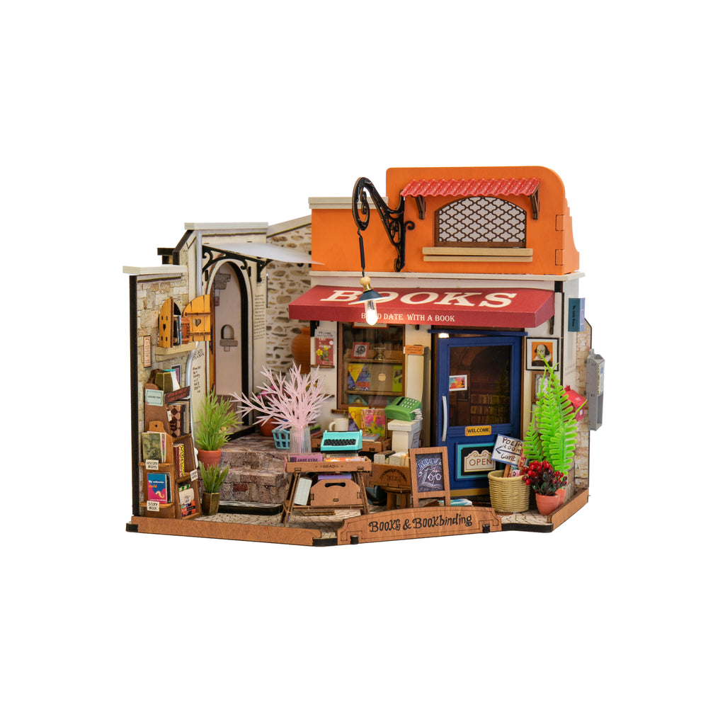 This DIY Corner Bookstore miniature model kit is a bookstore come to life. As you build, it will fill up with trinkets, curiosities, typewriters, and tons of books! With LED lighting, wiring, a battery box, and detailed instructions. Recommended age: 14+ 108 pieces Dimensions (once assembled): 9.84" x 6.57" x 7.09" 