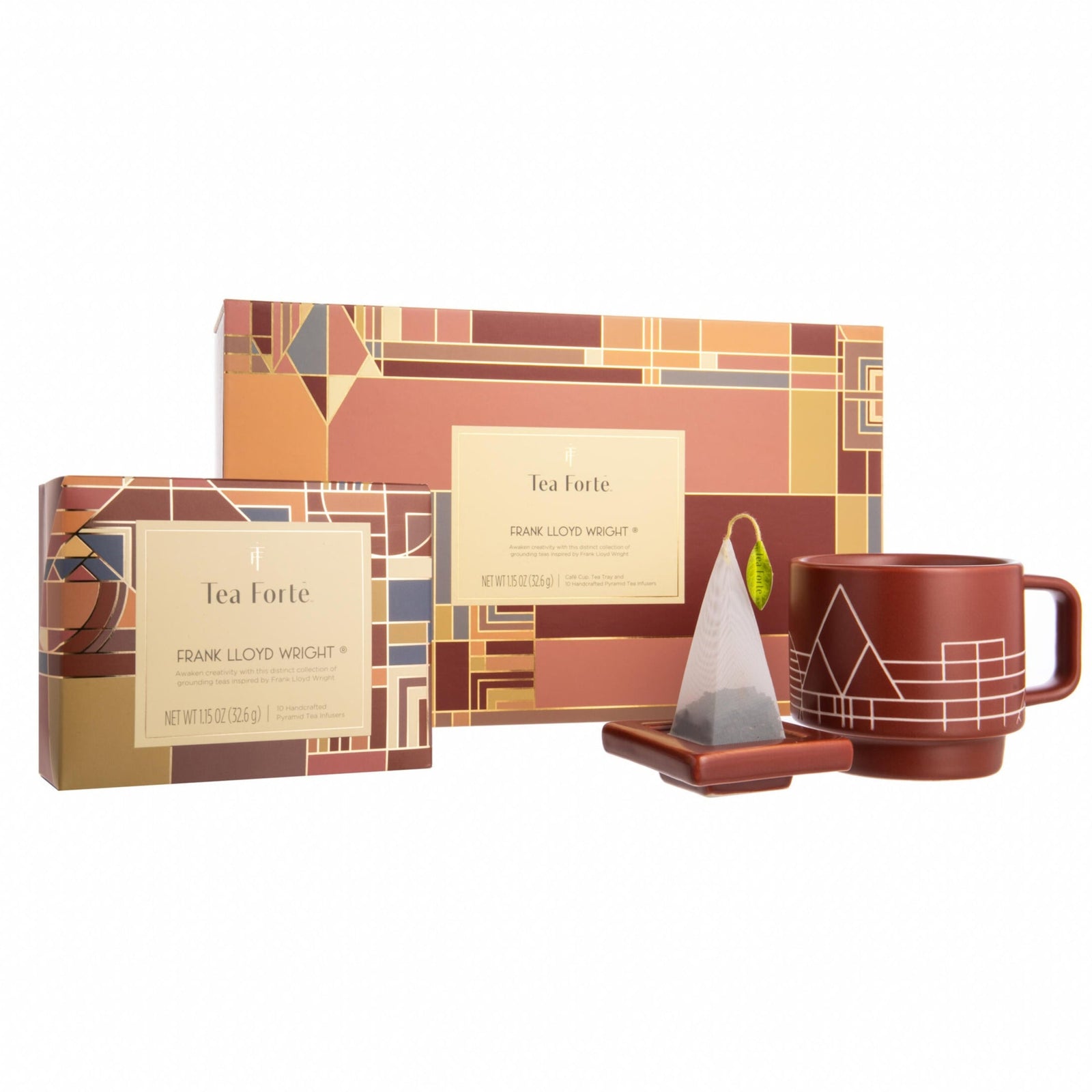 Tea Forte gift set with mug, tea bag, and packaging on a white background