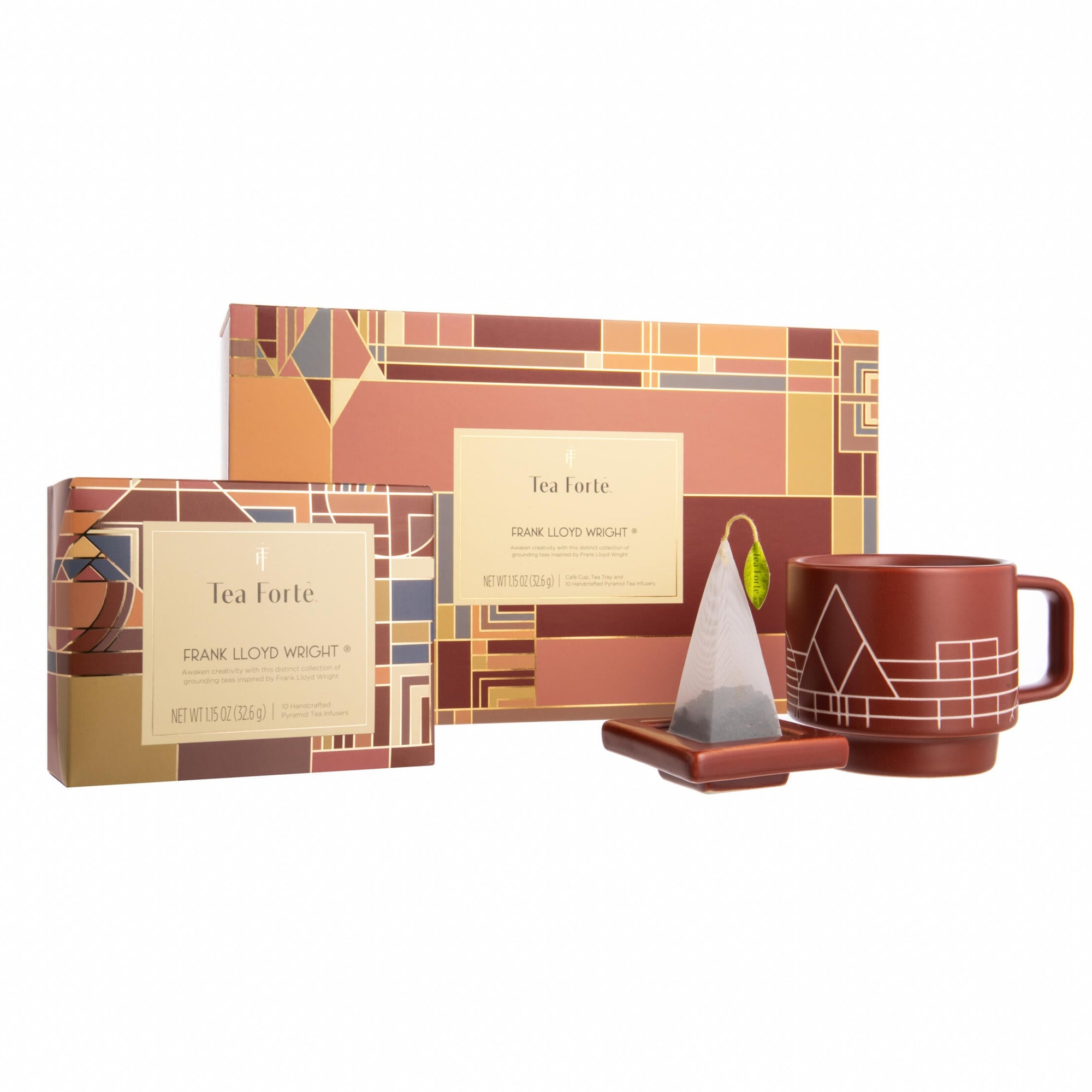 Tea Forte gift set with mug, tea bag, and packaging on a white background