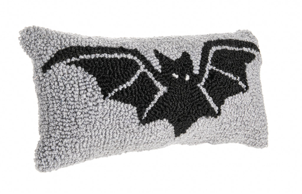 Add a ghoulishly great pop to your Halloween decor with this mini hooked spooky bat pillow. The front is made from hardwearing hooked acrylic wool which creates a wonderfully three-dimensional effect. The reverse is a soft grey cotton canvas. Spot clean. Cover not removeable. Dimensions: 8"x 8".