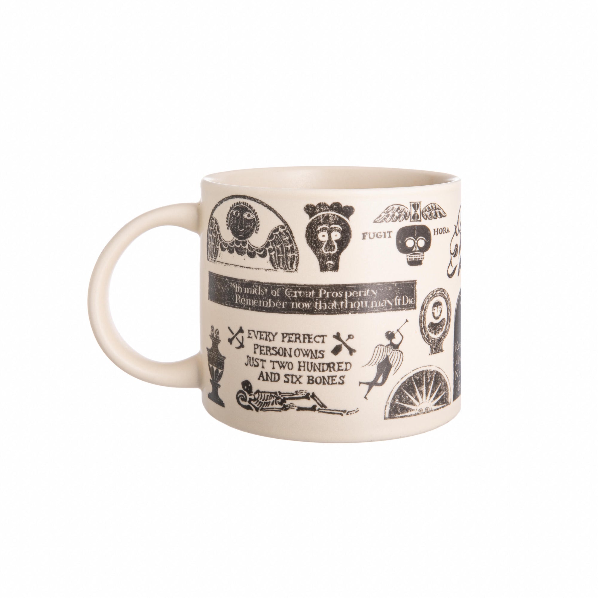 Memento Mori mug with decorative designs and text, accompanied by a matching box on a white background.