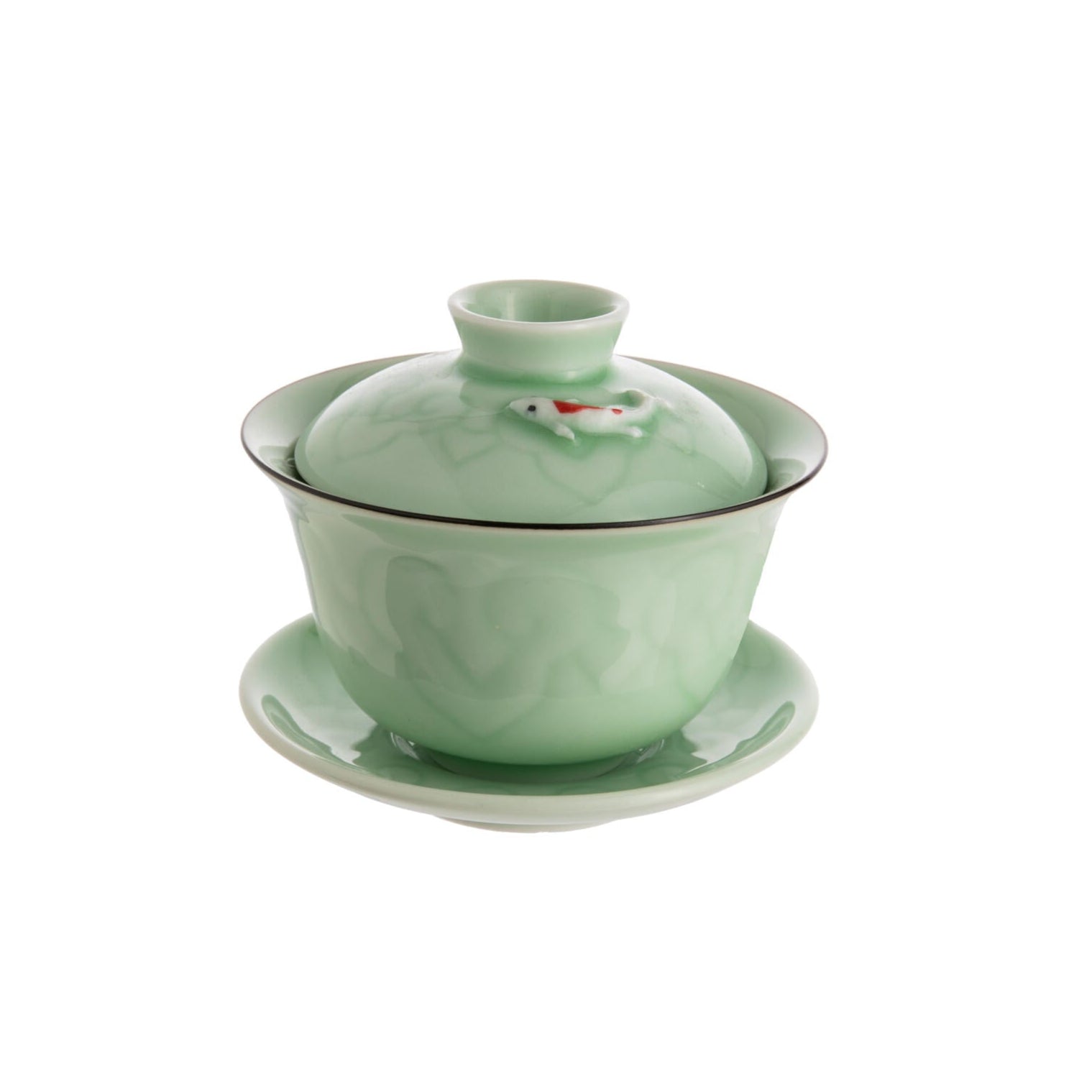 Green ceramic teacup with lid on a white background