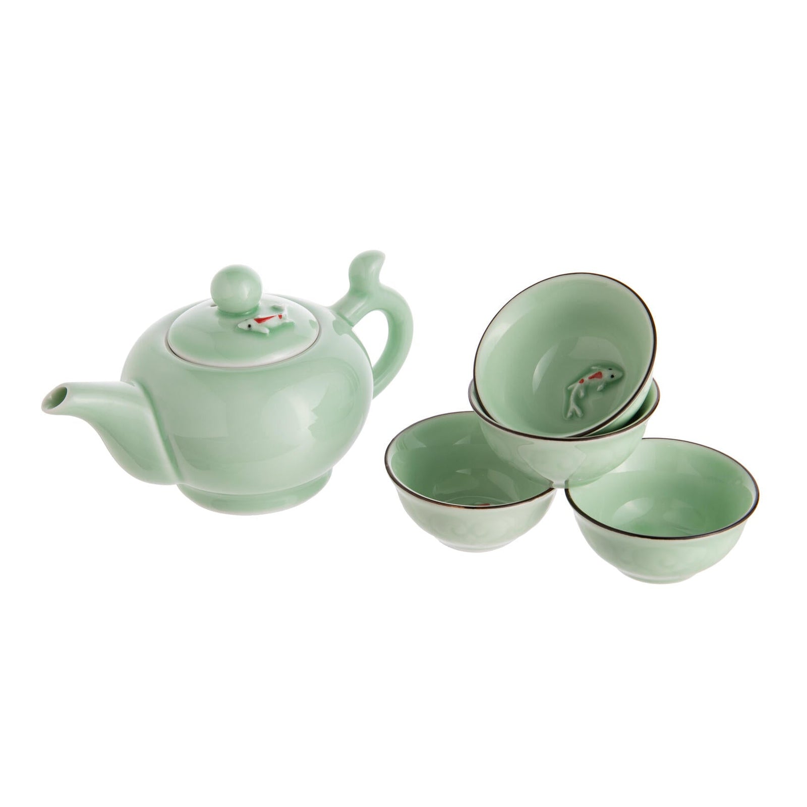 Green ceramic teapot and four matching cups with a detail of a koi fish, on a white background