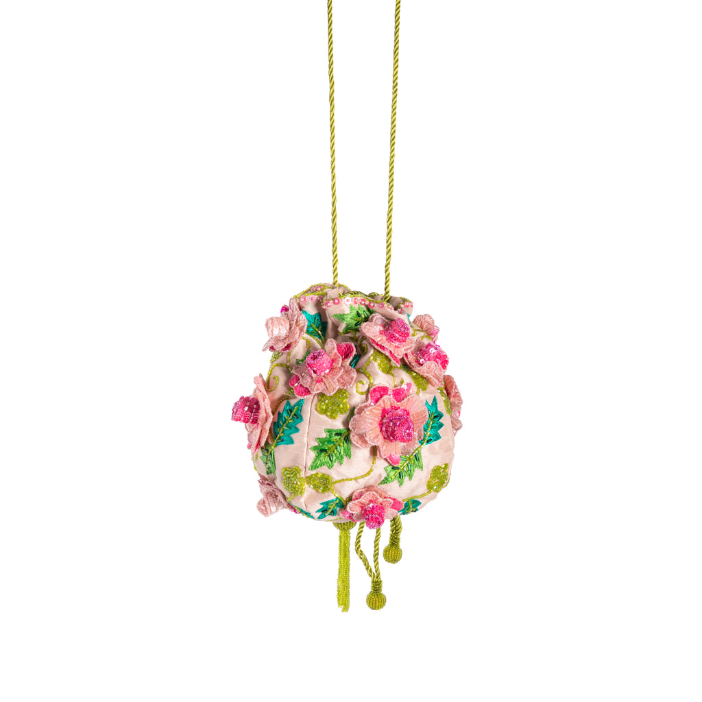 This exquisite and unique shaped purse is made with three-dimensional pink sequined roses which are enhanced by intricate embroidery in shades of contrasting, verdant green. It can be closed with a chartreuse-green drawstring cord and has two rope straps (one for the shoulder and one for the wrist). 7"L x 8"W x 8"H.