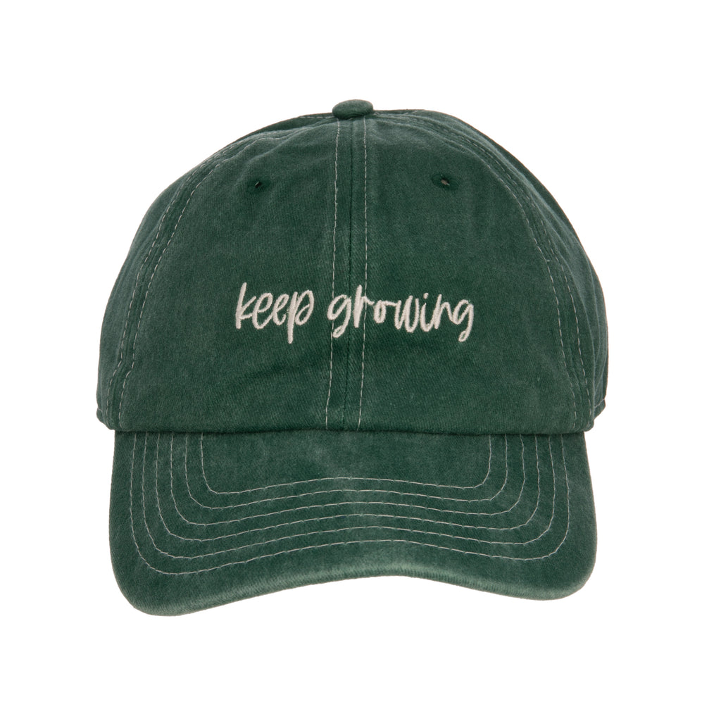 This earthy green baseball cap is perfect for, avid gardeners, yoga class devotees, golfers, dog walkers, runners and more! Featuring inspirational 'keep growing' embroidery on the front, and an adjustable metal buckle at the back to ensure the perfect fit. Materials: Cotton, Metal One size fits most Adjustable buckle.