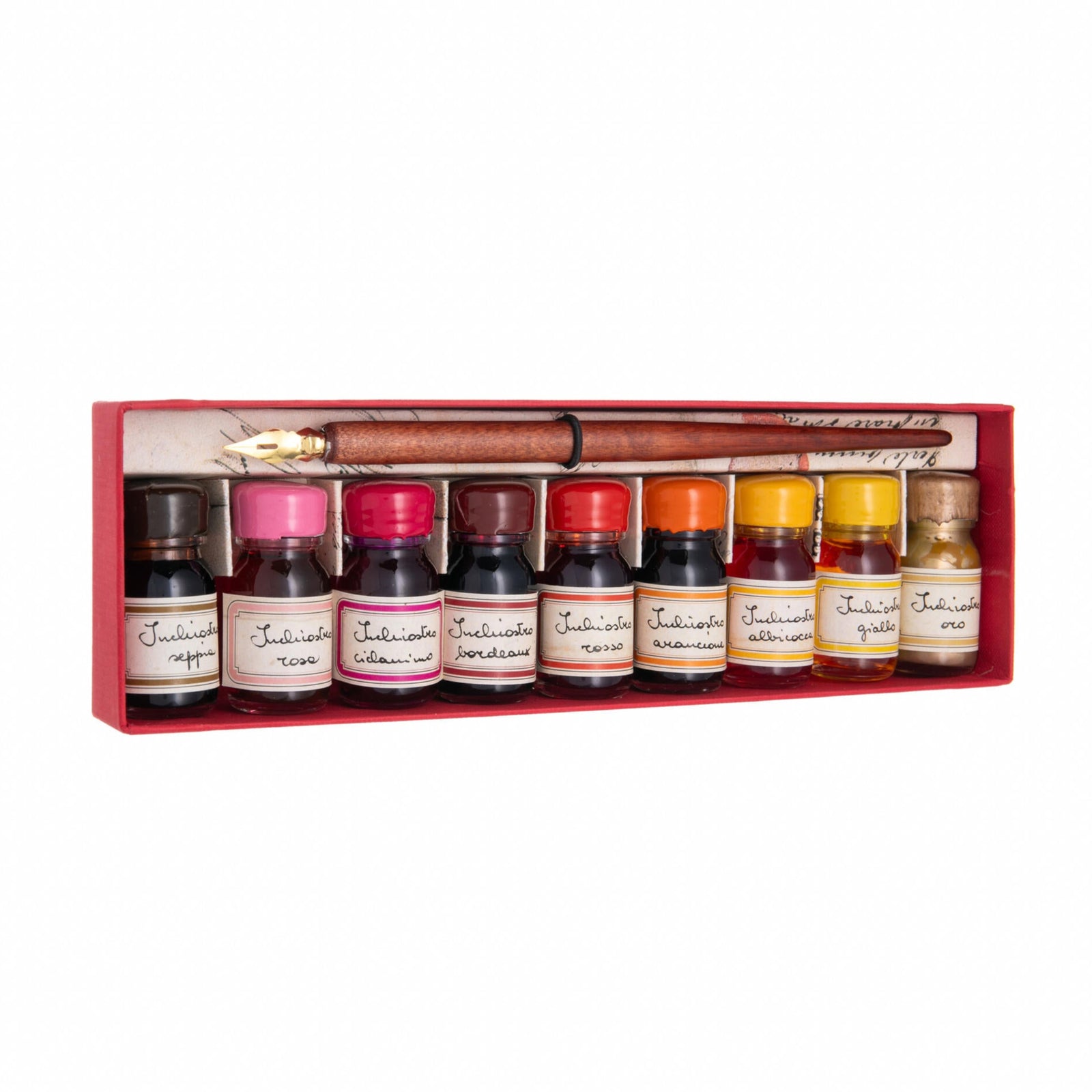 Set of ink bottles with a brush in a wooden box on a white background