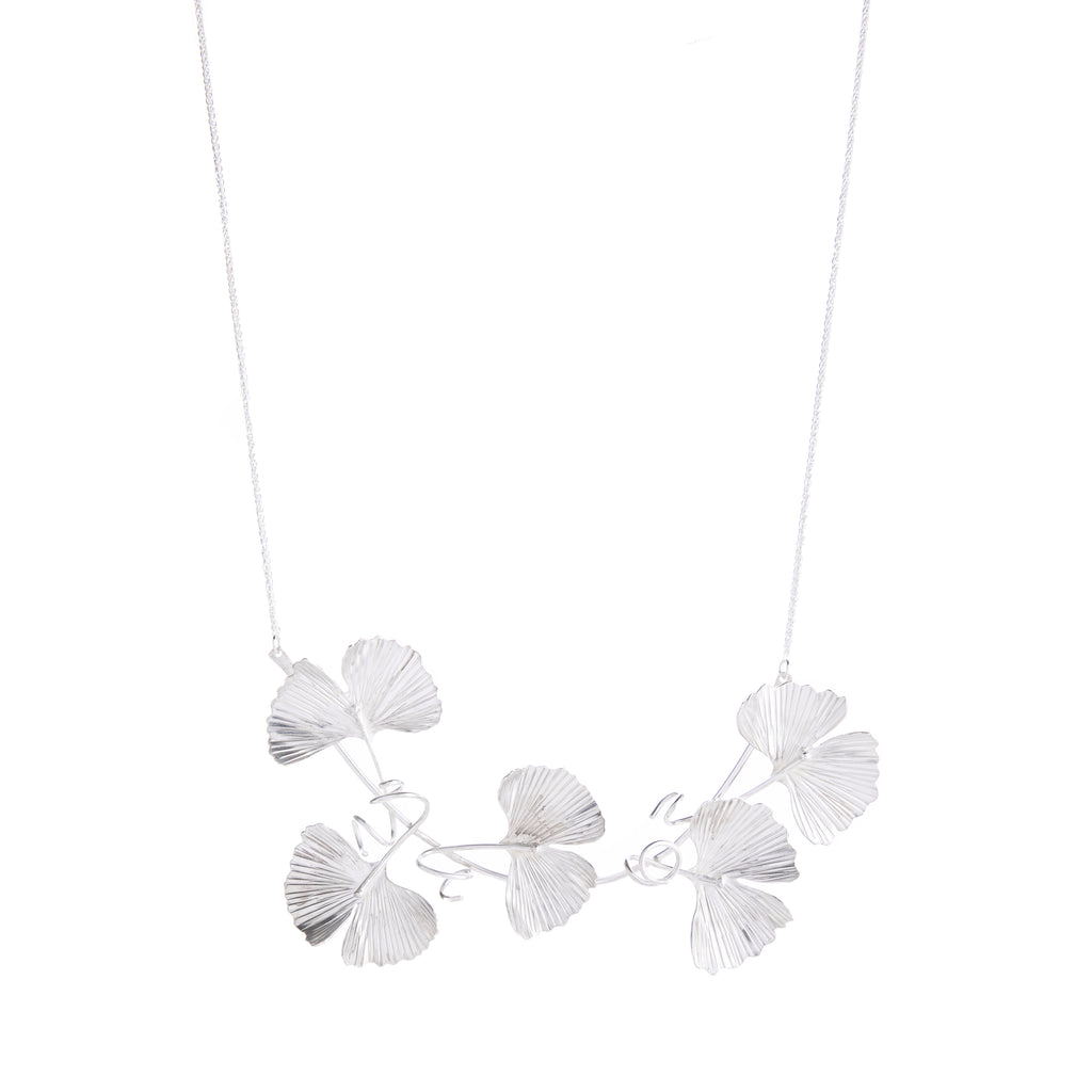 This exquisite Ginkgo sterling silver necklace is a true testament to craftsmanship and elegance. Meticulously handcrafted, wearably lightweight. Elevate your style with the timeless beauty of this collar, making a bold and sophisticated statement. Materials: Sterling silver Dimensions: Length, approx. 18".