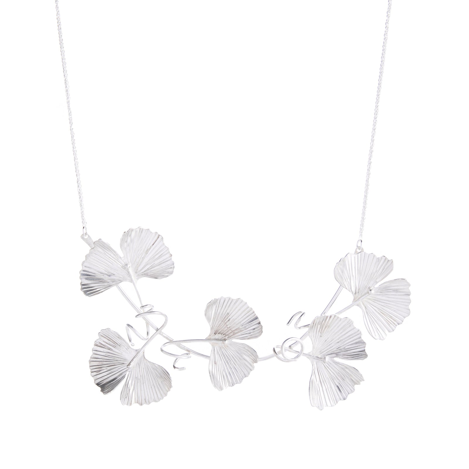 This exquisite Ginkgo sterling silver necklace is a true testament to craftsmanship and elegance. Meticulously handcrafted, wearably lightweight. Elevate your style with the timeless beauty of this collar, making a bold and sophisticated statement. Materials: Sterling silver Dimensions: Length, approx. 18".
