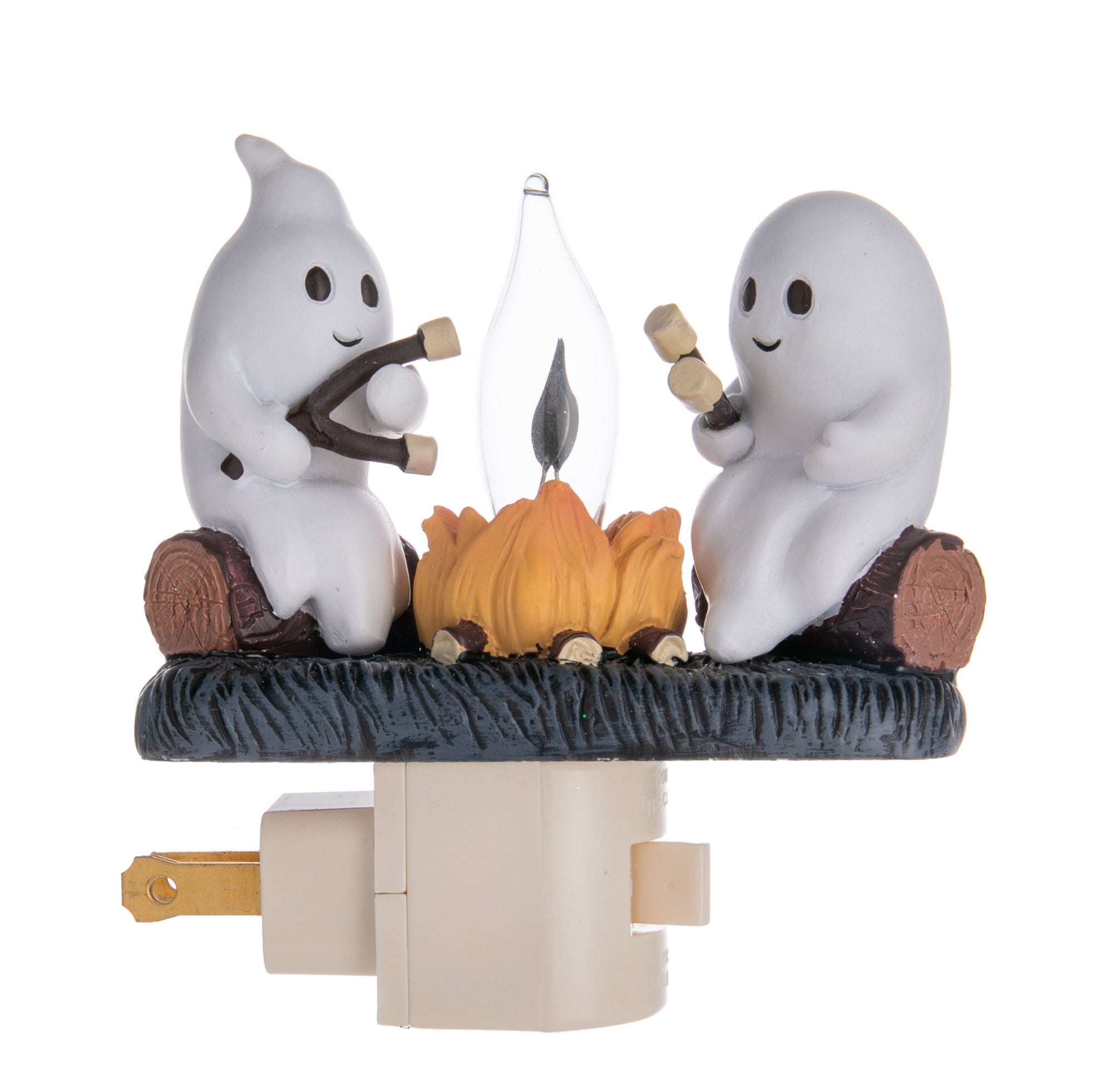 This playful nightlight adds a touch of fun to your room with its ghostly glow. Features two cute ghosts, roasting marshmallows around a cozy flickering campfire. Perfect for creating a warm glow or as a quirky nightlight for kids. Plugs into any standard 120v outlet. 360-degree swivel mount with on/off switch. 4.25" x 4" Ages 14+