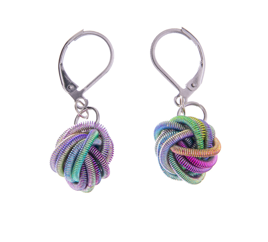 Even if you attempted the piano as a kid and never followed through with it... you can still wear these unique earrings made of actual piano wire! In rainbow colors featuring a knot detail and lever back clasp, these piano wire dangle earrings are stand out and are pretty enough for daily wear.  Dimensions: 1.25".