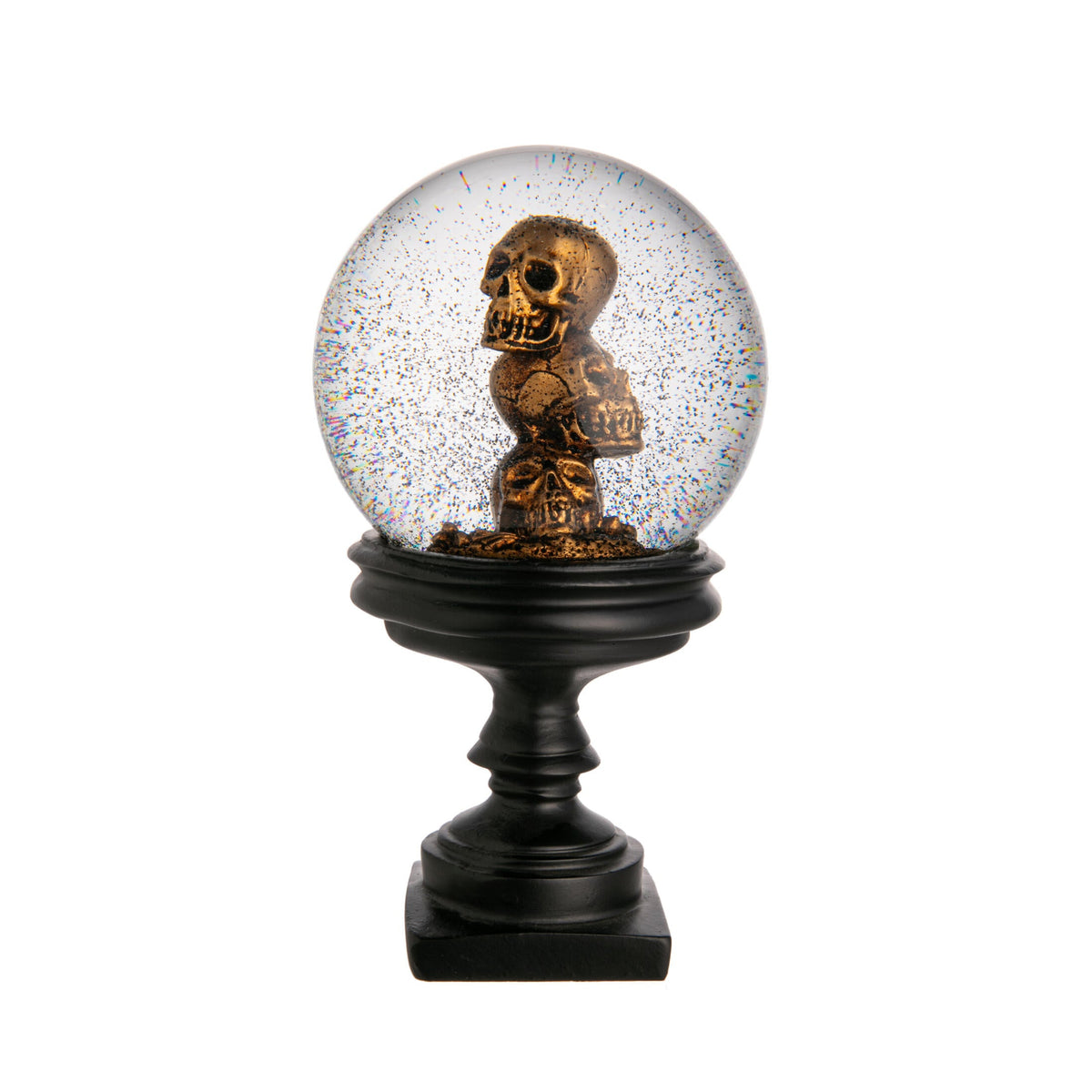 Decorative snow globe with a skull design on a white background