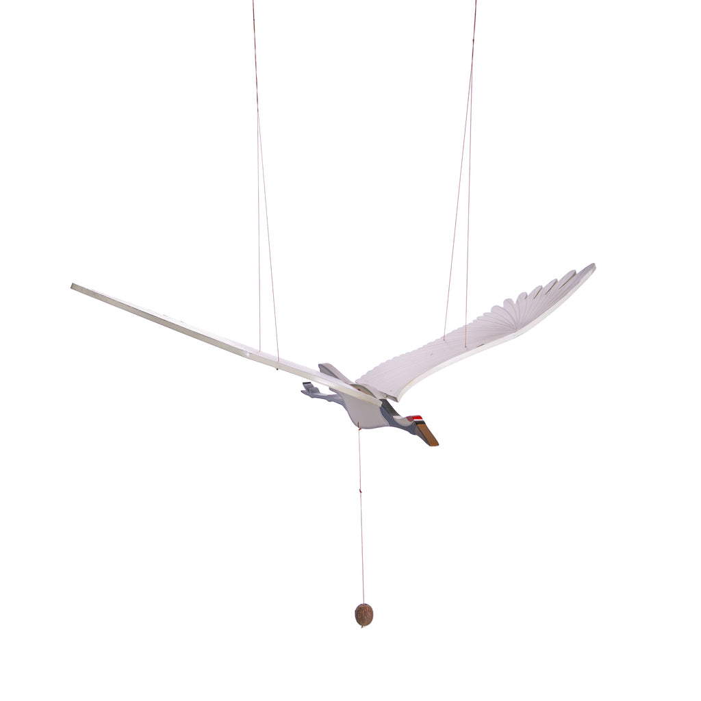 This crane mobile is an art piece in itself. Move the wings for maximum effect by pulling and releasing the bottom string. Best enjoyed indoors, this mobile is handmade using medium-density fiberboard. A wonderful gift or hung as a conversation piece. Dimensions: 27" Wingspan Handmade in Colombia Fair trade product