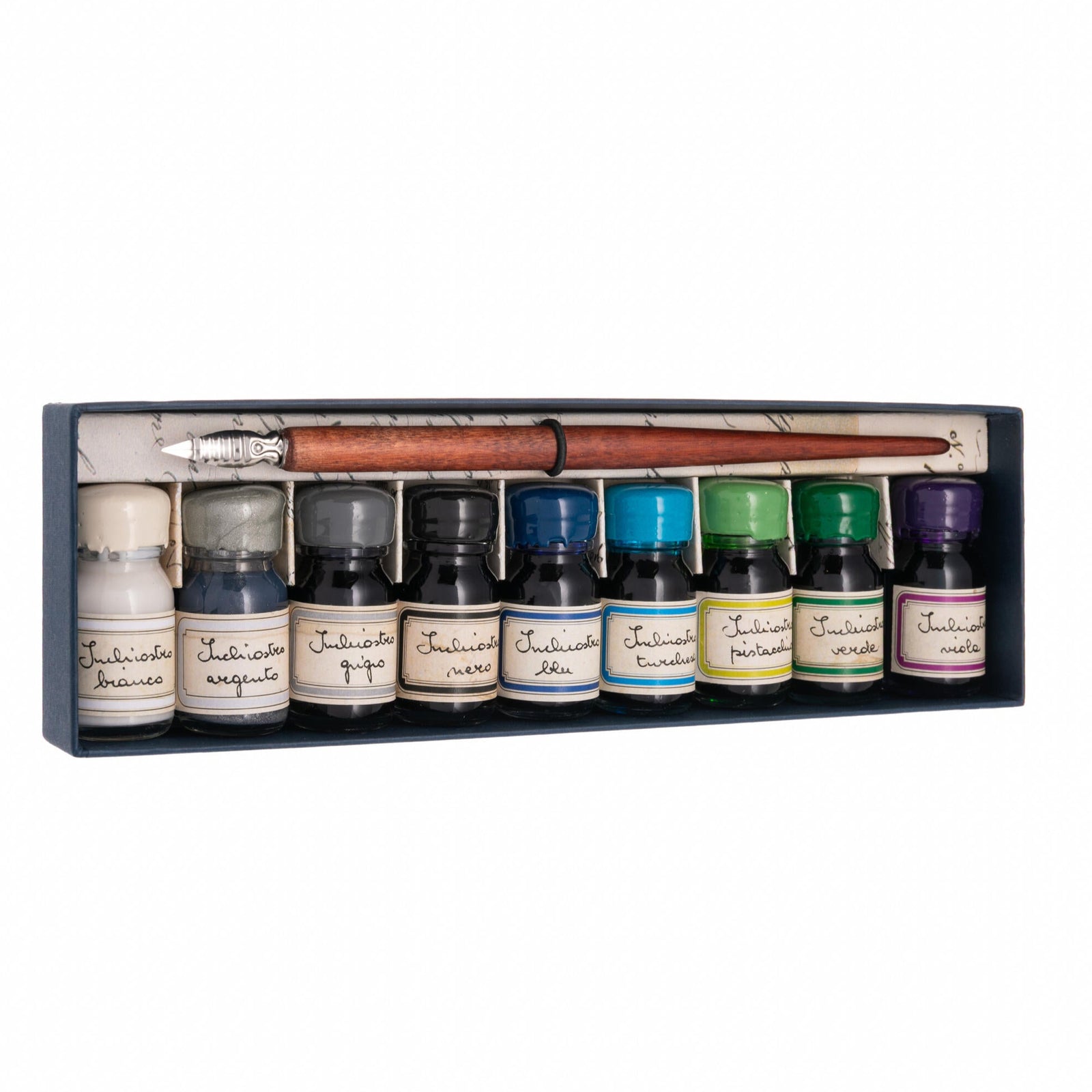 Set of ink bottles with a brush in a wooden box on a white background