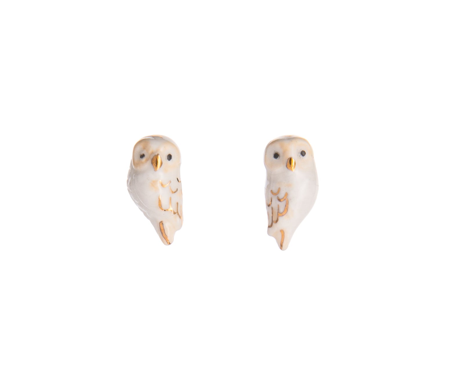 These charming tiny owl studs will perch perfectly on your ear. Hand-painted with gold detail, these little owls add a delicate touch of nature to your look. This makes the perfect gift for any owl lover or bird watcher. Lead and Nickel-free Material: Porcelain, Gold-plated Stainless Steel Designed in Toulouse, France 