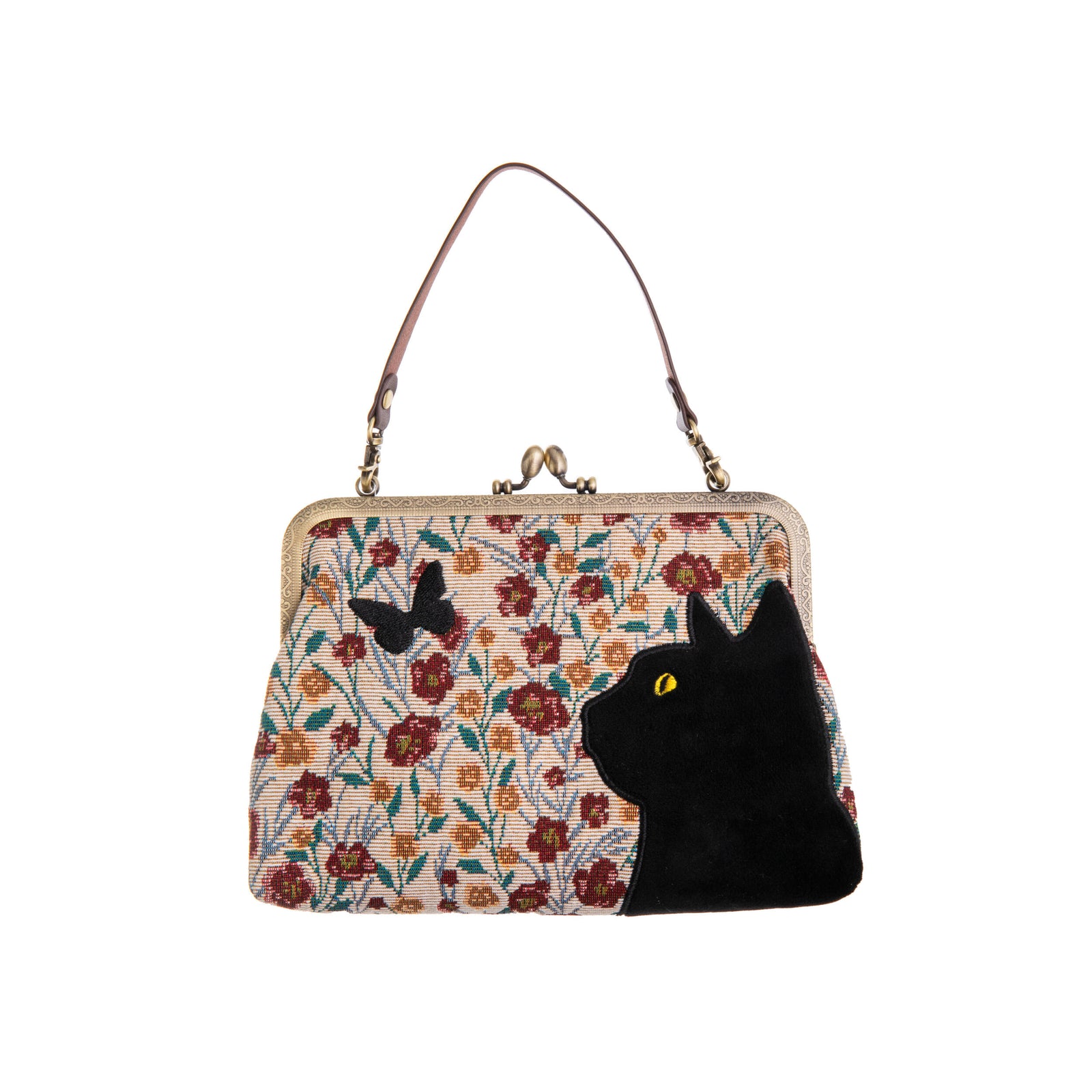 Handbag with floral pattern and black cat design on a white background