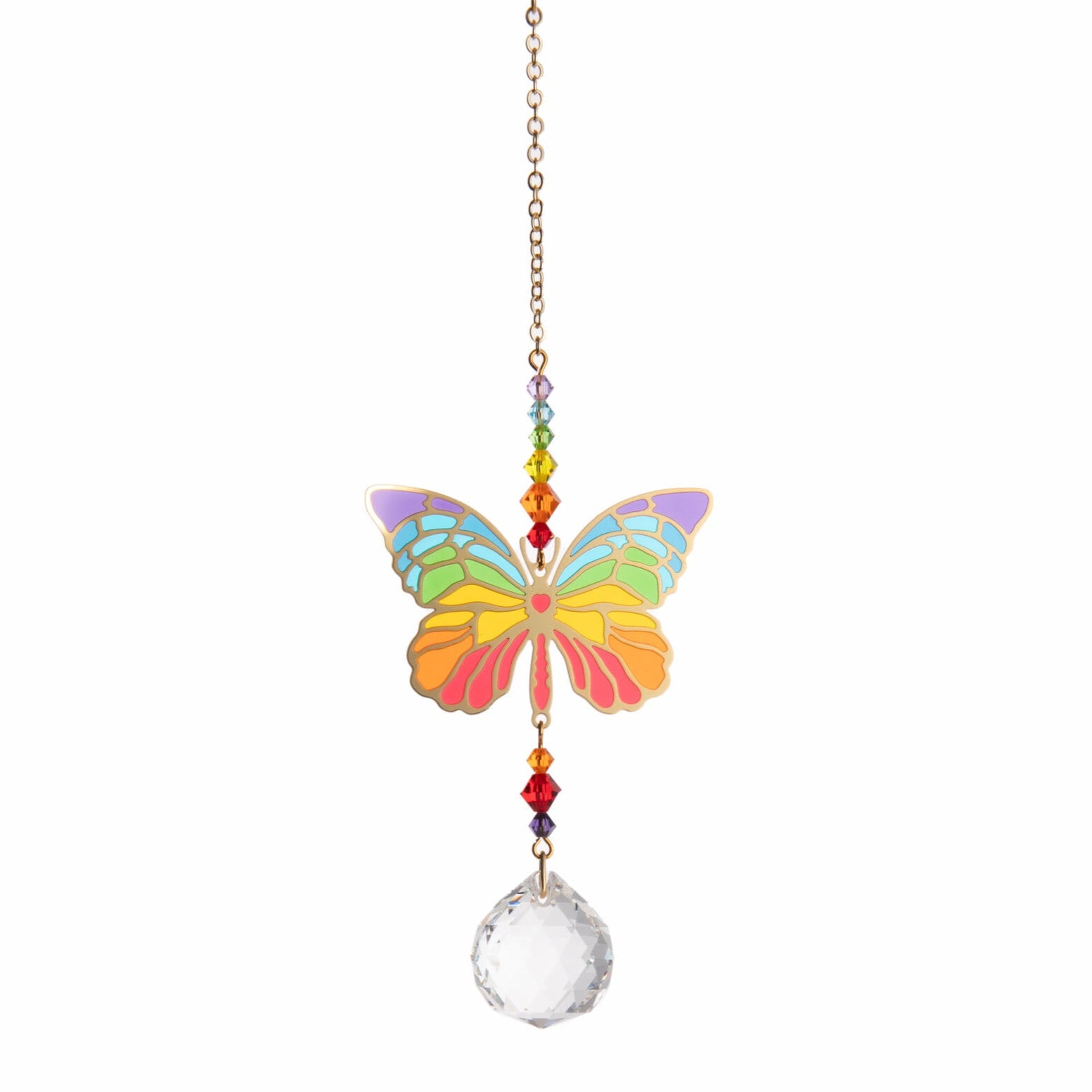 This handmade light-catcher features a chakra rainbow of genuine Austrian crystal hearts, and a ‘stained glass’ effect butterfly, finished with a round faceted crystal droplet. This delightful charm will add a sparkle of color to your windowsill each time it catches the light. Materials: laser-cut metal with Austrian crystal Includes a hook for easy hanging Dimensions: 5.5" x 1.5"