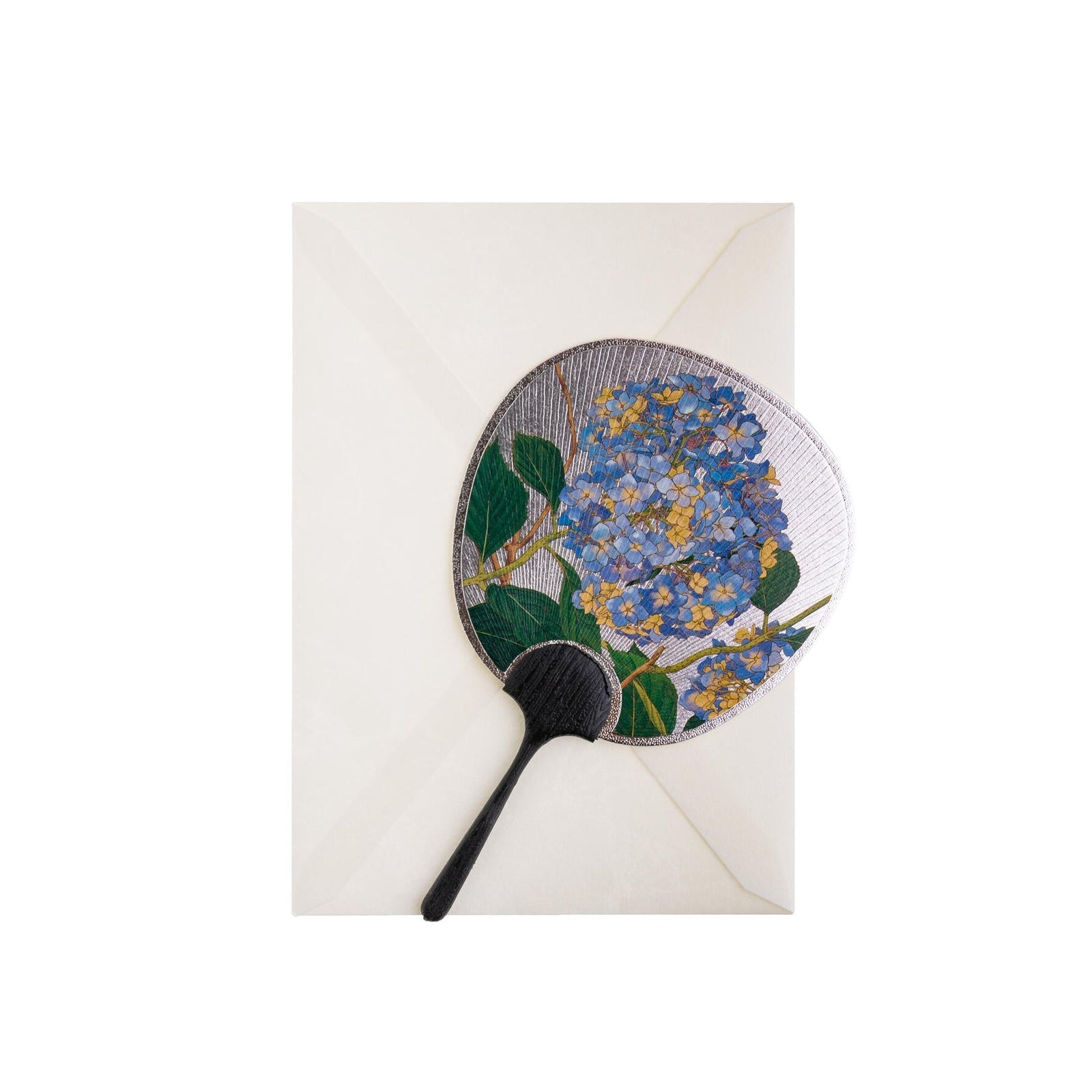 Decorative fan with floral design on a white background