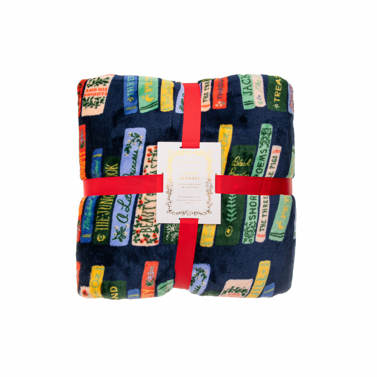 Folded blanket with colorful text pattern and red binding on a white background