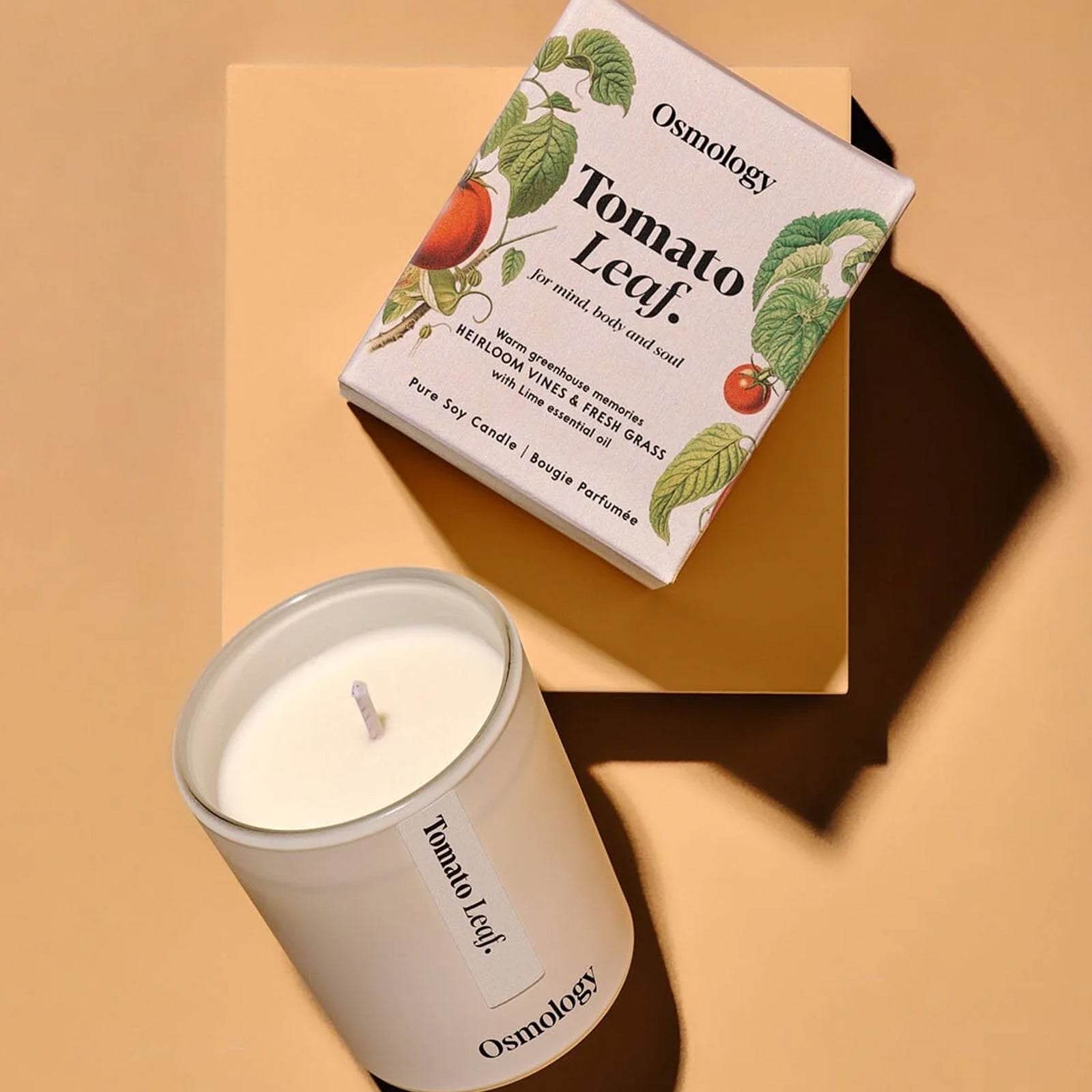 Indulge in the invigorating scents of a botanical sanctuary with this Tomato Leaf Scented Votive Candle. Energize and uplift your living spaces with a perfect blend of fresh grass, bright lime, and nostalgic tomato leaf. Perfect for the kitchen or bathroom, this candle brings a touch of nature to your home. 100% plant-based wax. 100% cotton wick 2.8 oz 