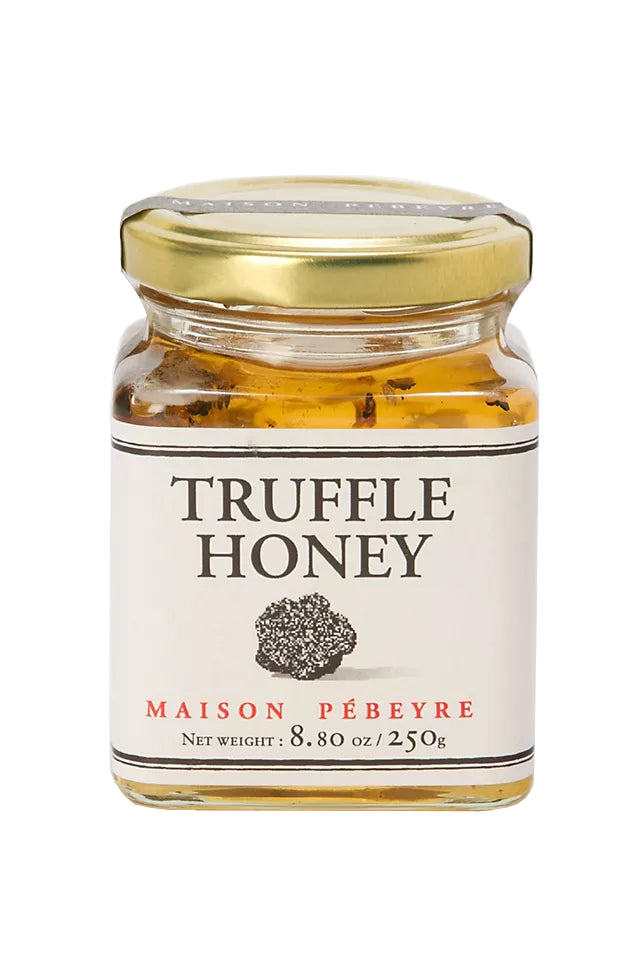 This deliciously decadent Summer Truffle Honey has a smooth texture, with a powerful white truffle aroma. The taste is uniquely sweet & earthy with extraordinary depth from the white truffles. Truffle infused honey in a glass jar 8.8 oz.