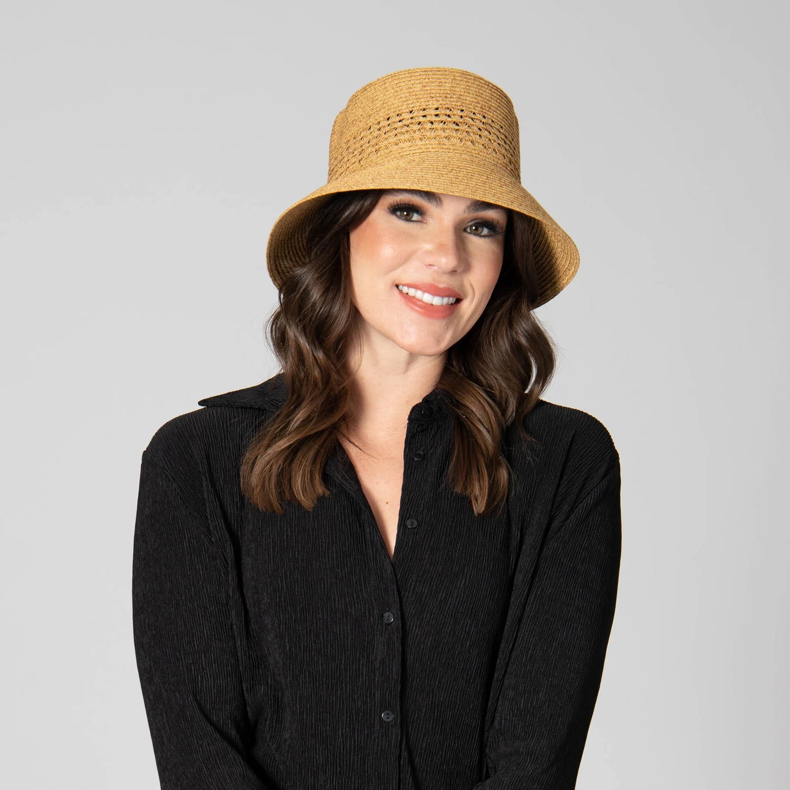 For classic sun coverage, look no further than this woven ultra-braid bucket hat! It is versatile, elegant and comfortable enough for everyday wear. Perfect for the beach, running errands, or sunny evening strolls! Brim Size: 3" Women's one size 75% paper, 25% polyester.