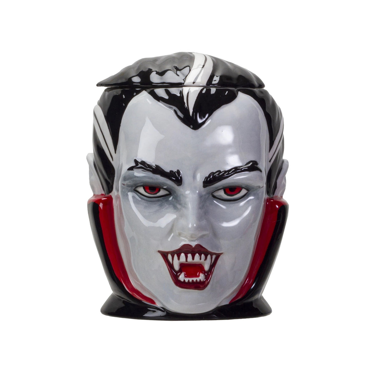 Ceramic cookie jar shaped like Dracula's head on a white background.