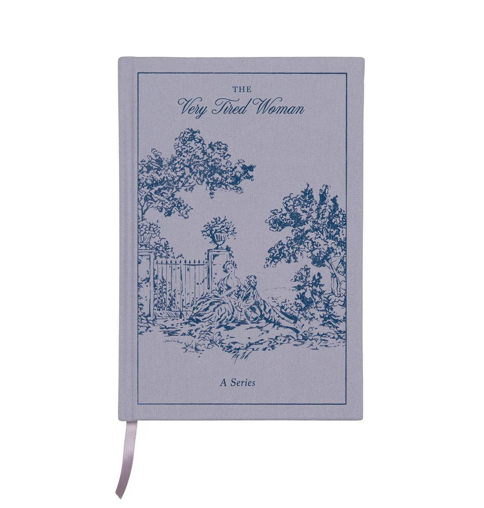 This vintage book-inspired journal features book-cloth covers, patterned end-sheets, and ivory paper like your favorite old novels. The blue book-style cover has a toile-inspired design and "The Very Tired Woman" printed as its title, making it a wonderfully whimsical place to collect your thoughts and ideas.