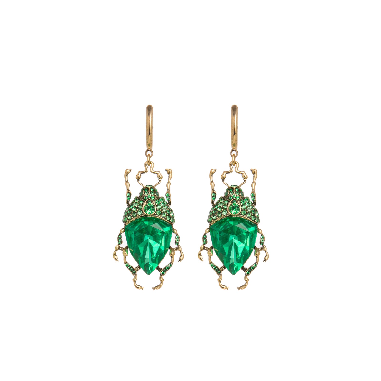 Pair of green gemstone bug earrings with gold accents on a white background