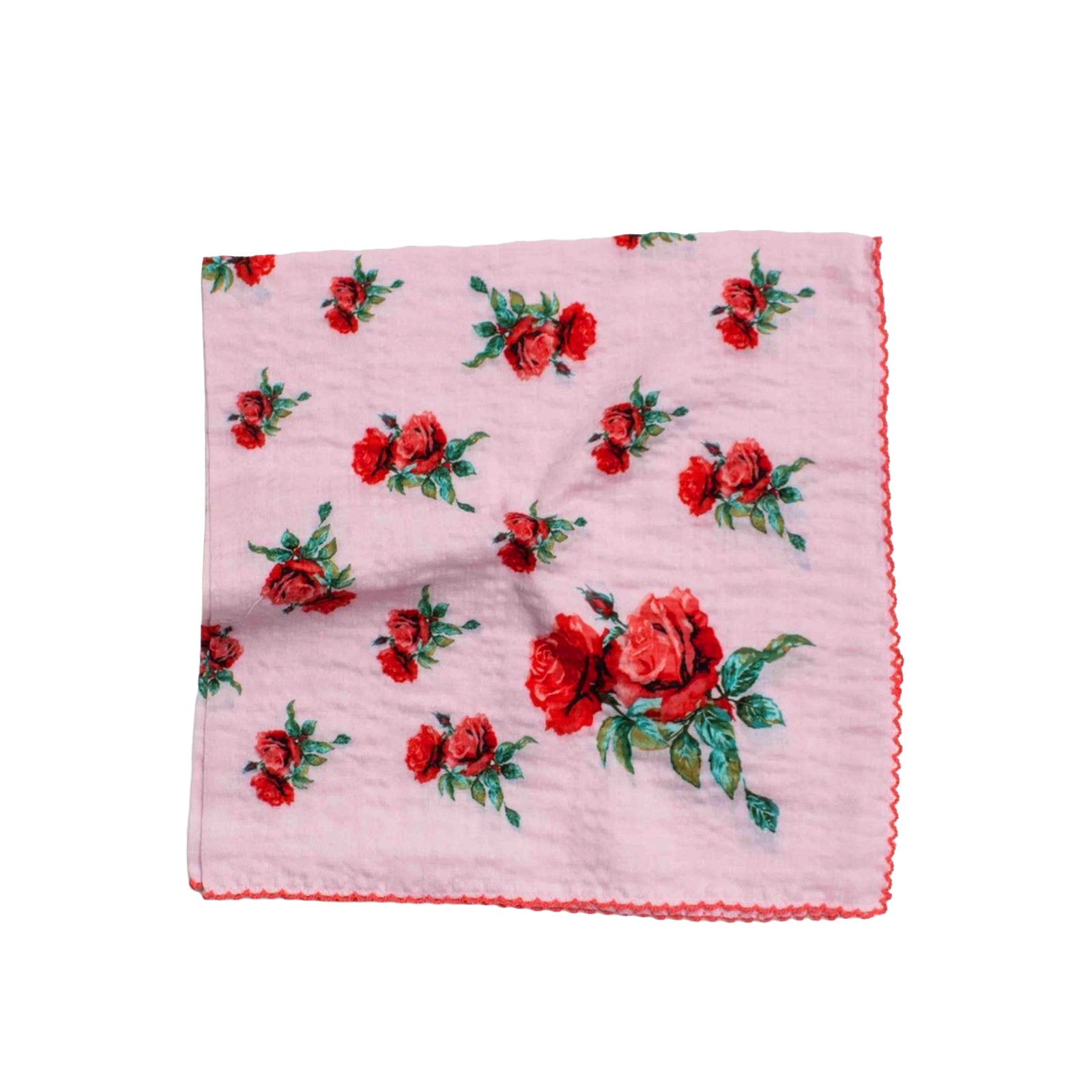 Pink cotton bandana with a red vintage style rose print and a scalloped edge on a white background.