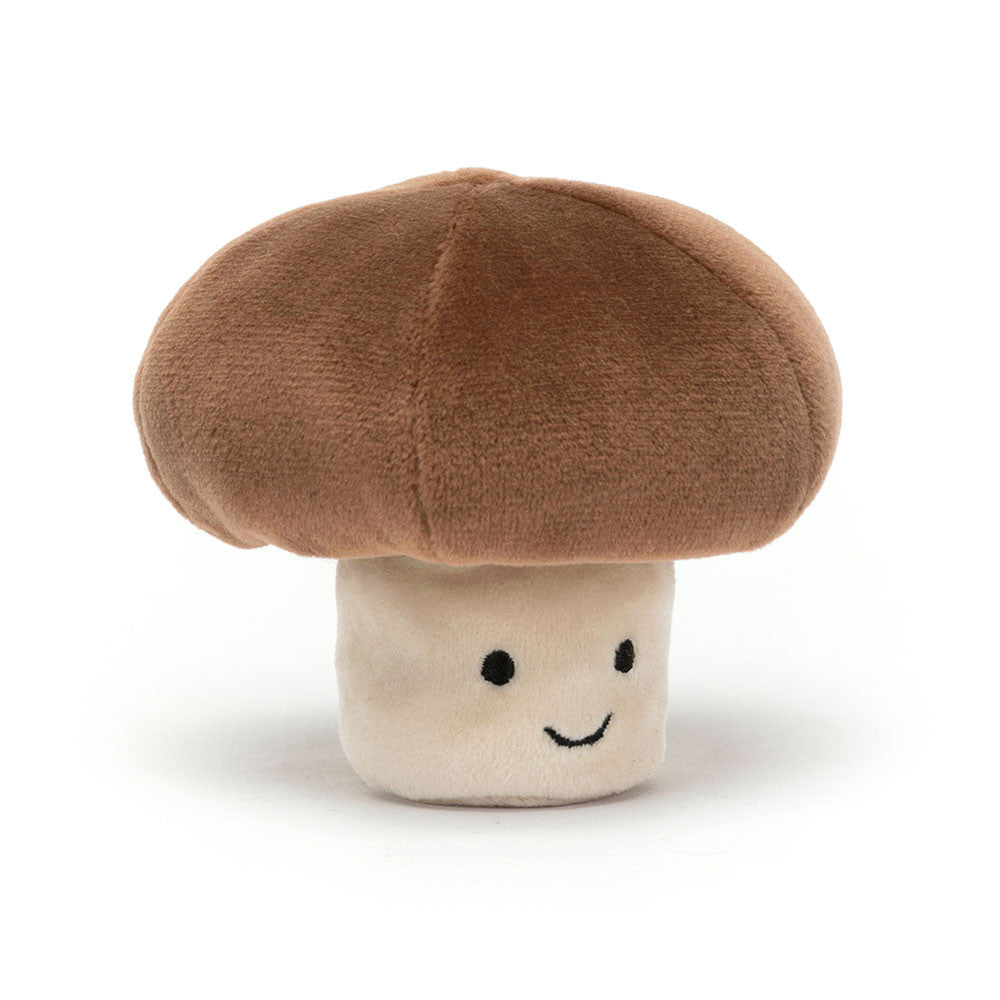 Wander through the woods and wave hello to Vivacious Vegetable Mushroom! This bobbly buddy is stretchy-soft with a chunky chocolate cap and squat vanilla stem! This merry mushroom loves chilling in the shade beneath the trees, chatting to the bugs and birds that stop by. Dimensions: 3.1" x 3.5" x 3.5".