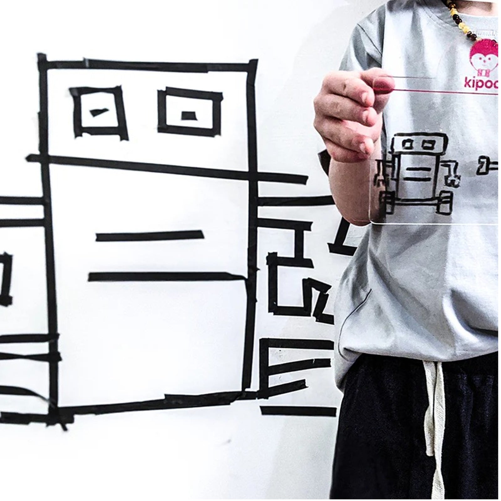 Grafitape washi tape art projector with packaging on a white background