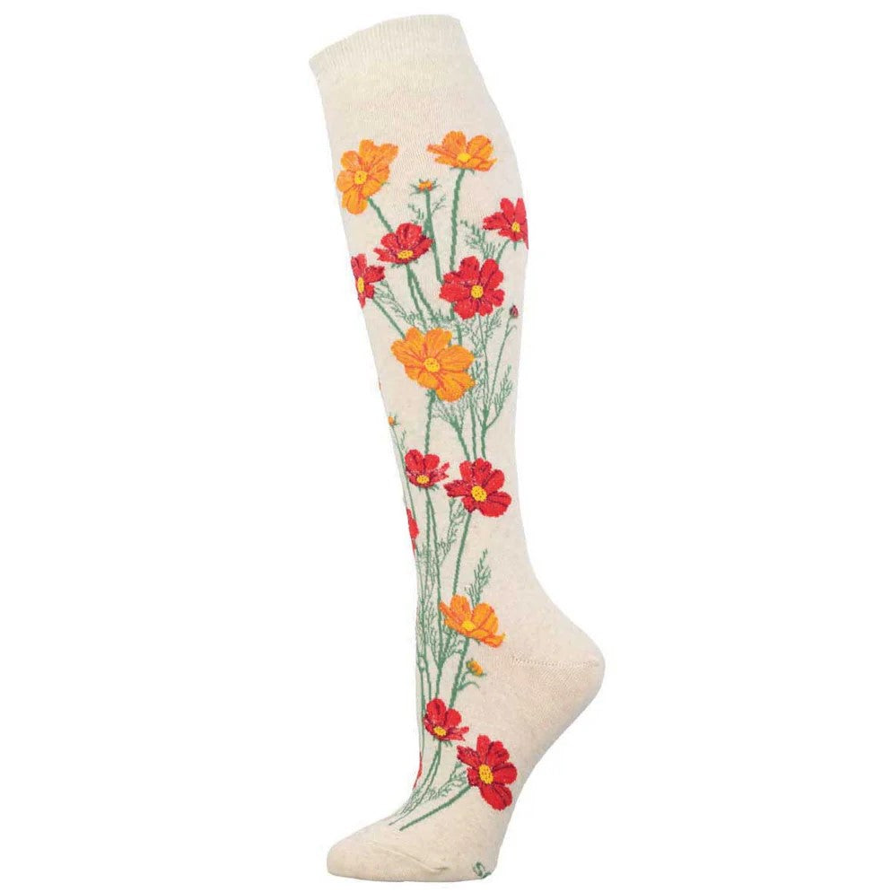 Weed or wildflower? Depends on how you look at it, but we choose wildflower. These colorful, knee-length socks are your reminder to keep on blooming in all the places people thought you'd never grow. Size: S/M 9-11 (Women's Shoe Size 6-10.5 and Men's Shoe Size 5-9) Fiber content: 55% Cotton, 19% Nylon, 2% Spandex, 24% Polyester