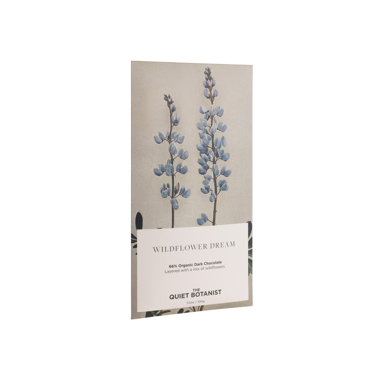 Product packaging with floral design and 'Quiet Botanist' branding on a white background