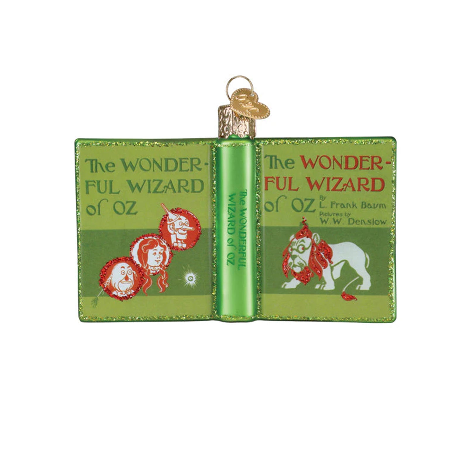 Holiday ornament shaped like a copy of the book 'The Wizard of Oz' on a white background