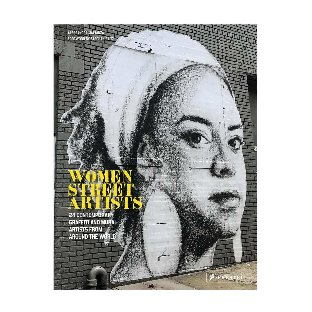 Book cover featuring a street art mural of a woman&#39;s face on a brick wall.