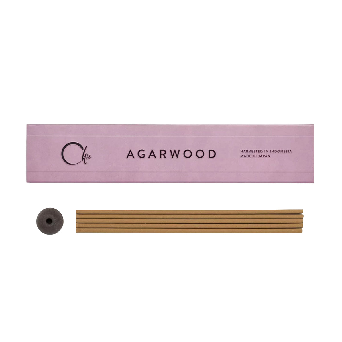 Agarwood incense stick set with pink packaging on a white background
