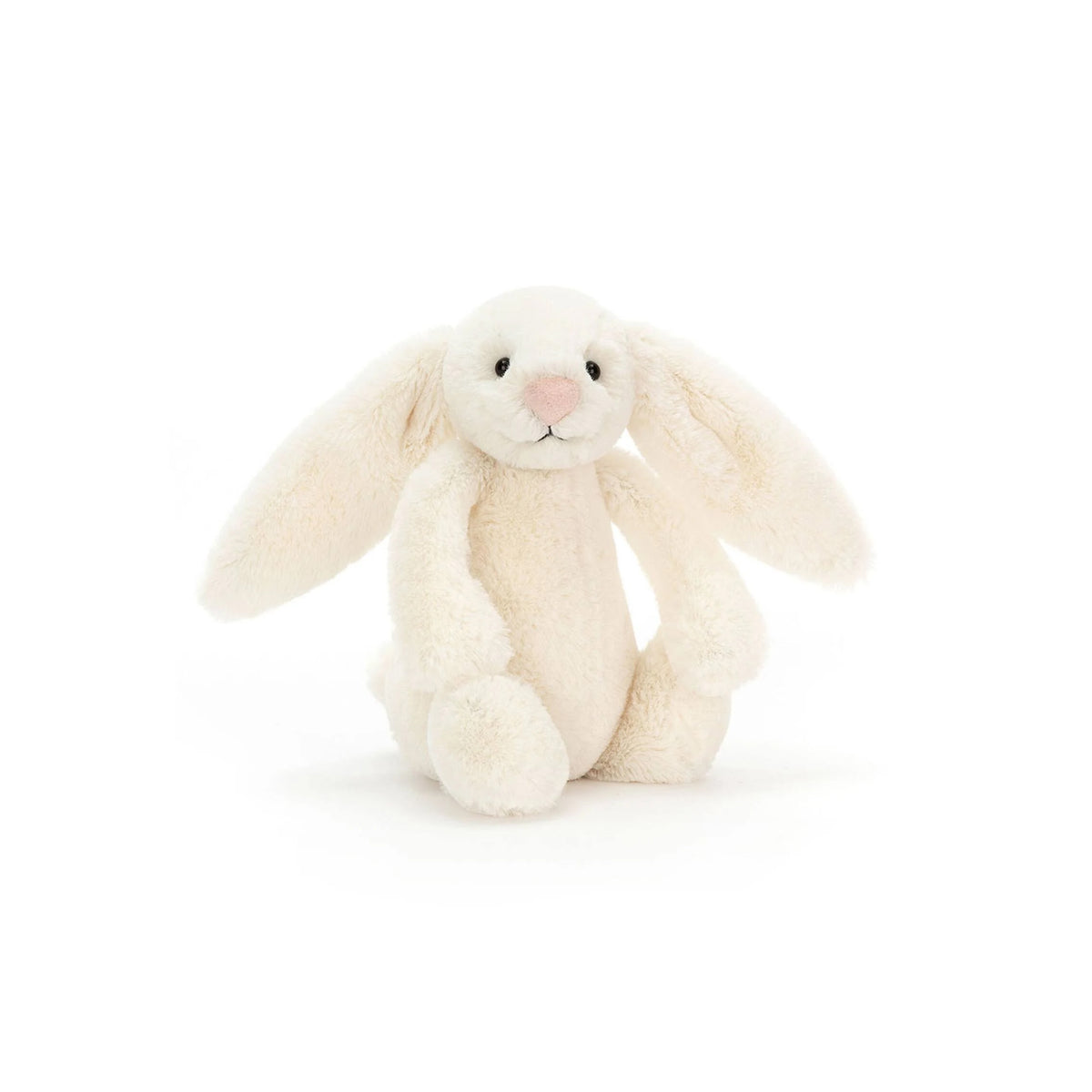 Cream-colored bunny plush toy on a white background