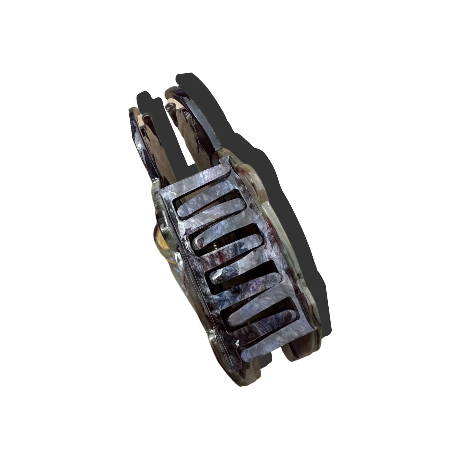 Add a pretty flourish to any up-do with this hand-finished beetle claw hair clip. It is double-sided for a perfect look from every angle and has hand-painted accents, making each clip unique. Unlike most plastic accessories, these small-batch styles are made from premium materials including a biodegradable wood pulp acetate, making these clips both beautiful and kind to the environment.