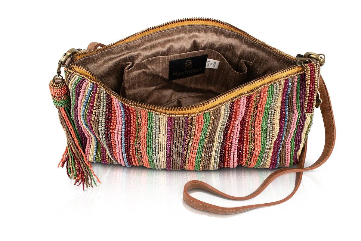 Multicolored striped handbag with a brown interior on a white background