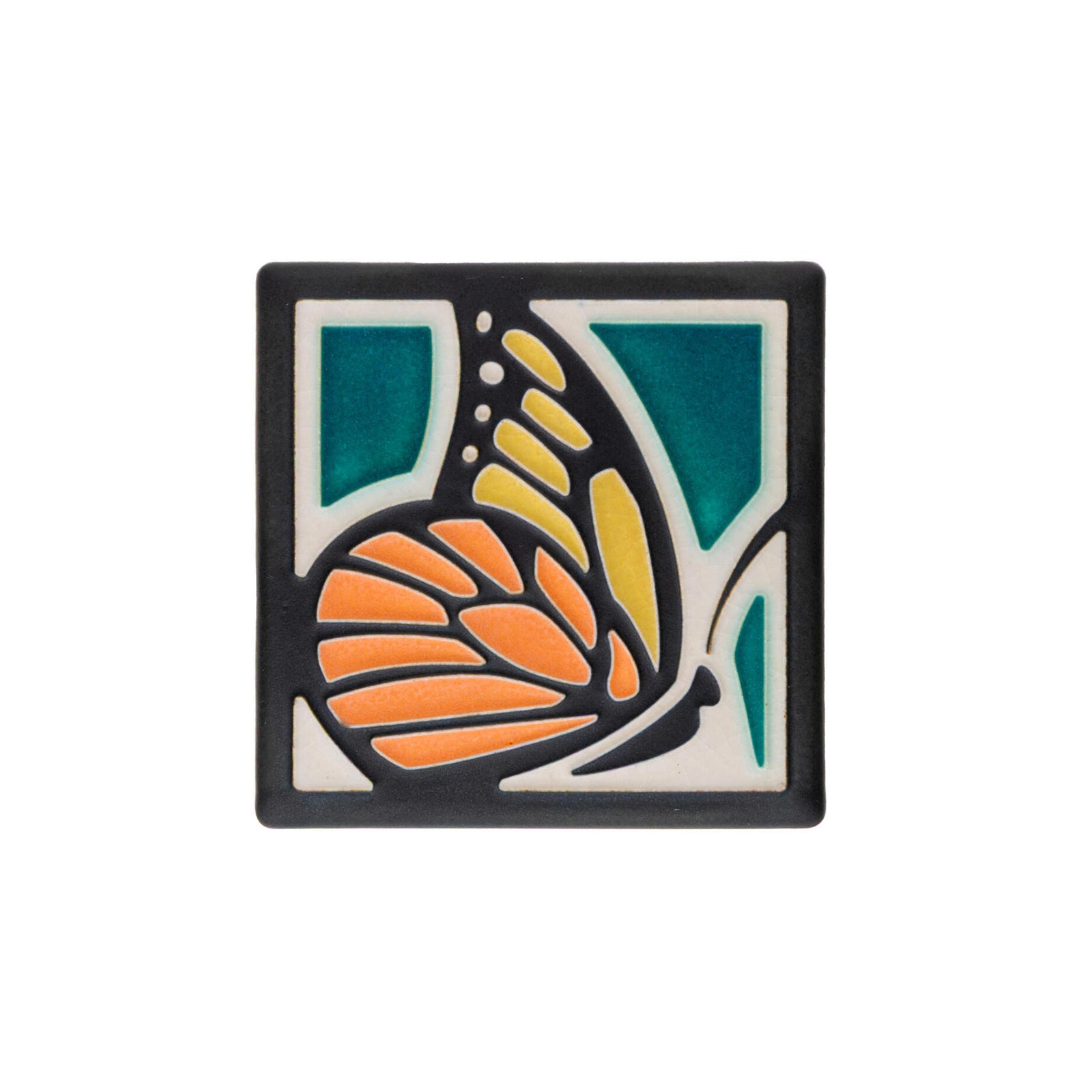 This delightful Motawi Tileworks tile depicts an elegant monarch butterfly with a deep turquoise background, rendered in a classic Arts & Crafts style.